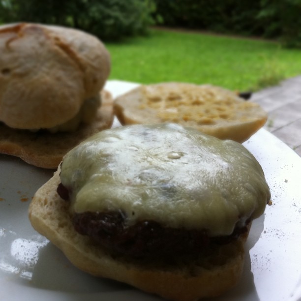 Cheeseburger with Dijon mustard and Ciabatta on the for lunch