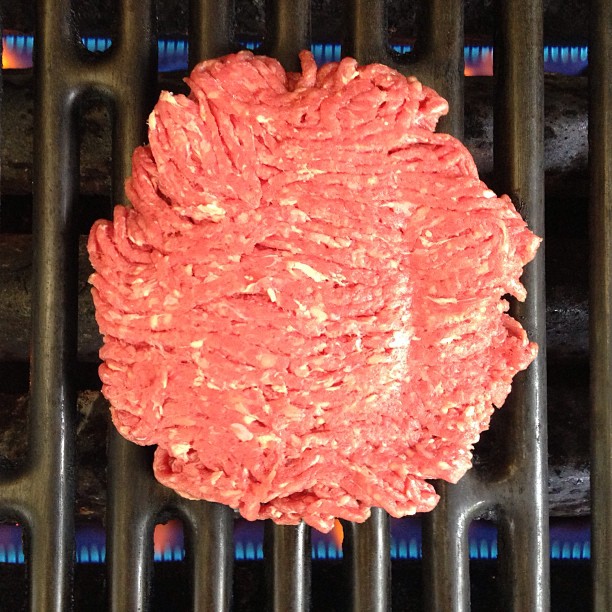 Red, white, and blue burgers on the with those flames in the background